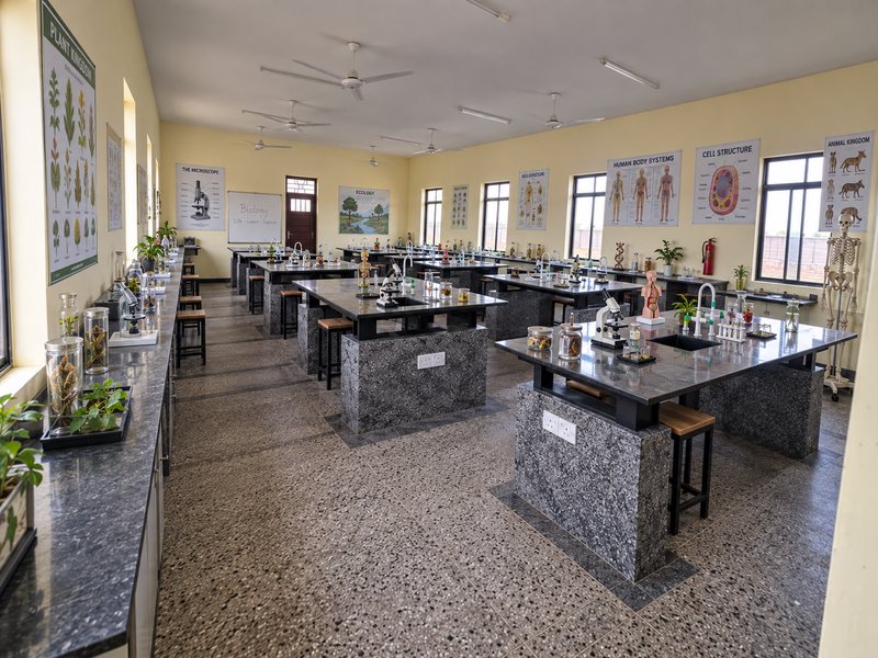 The biology laboratory, with microscopes and specimens